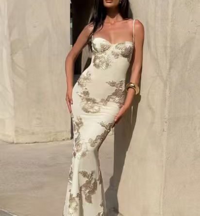 Dress with embossed floral embroidery.