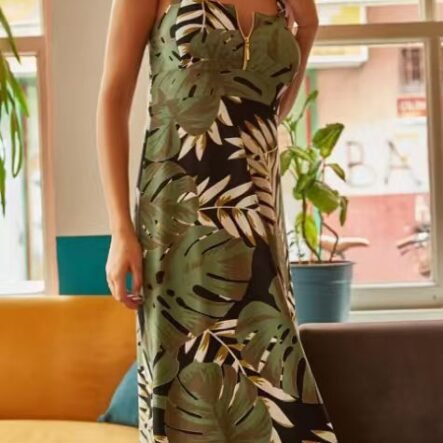 Women's dress with large palm pattern with green zipper